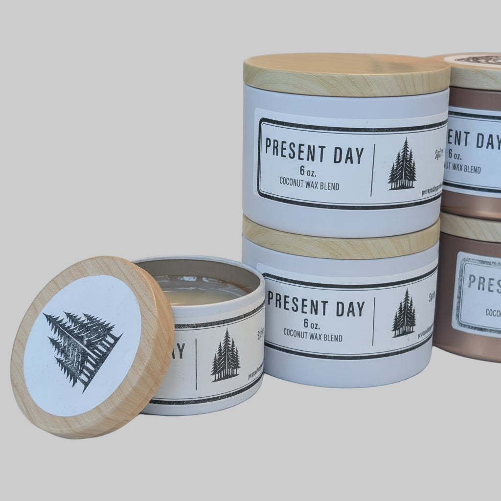 Stack of two 6 ounce candles and an opened 3 ounce candle