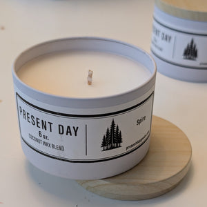 Candle in a white container with a wooden printed tin lid