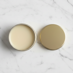 Gold-colored metal cap on a white background