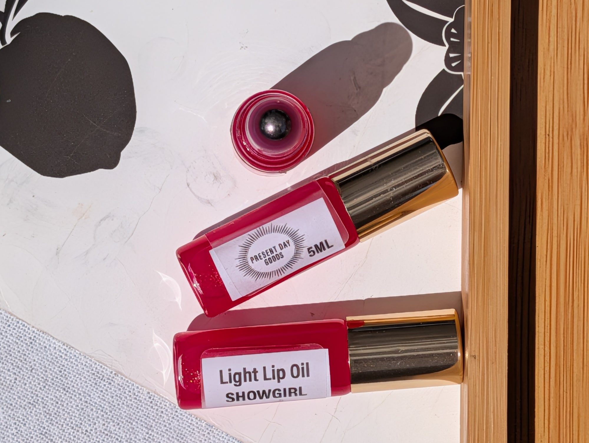 Showgirl Light Lip Oil Rollerball — Sheer Tint, 5ml